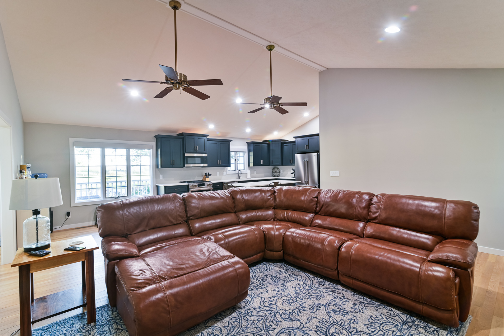 9220 Heritage Road Clinton, IL 61727 - Photo 10 of 37 a living room with furniture a ceiling fan and a window