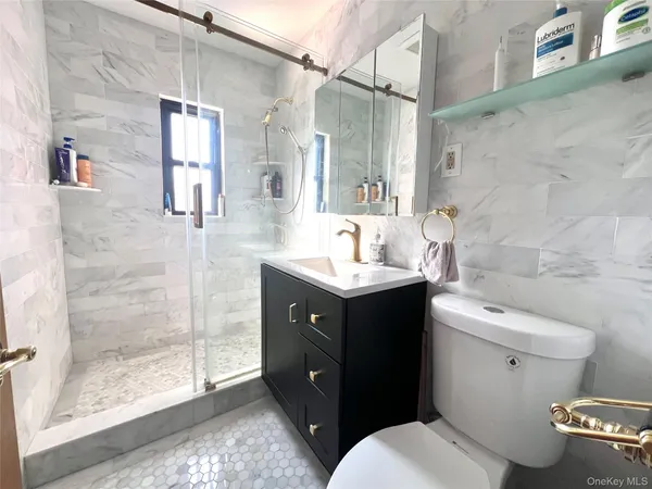 $828,000 | 2561 Eastchester Road | Pelham Gardens