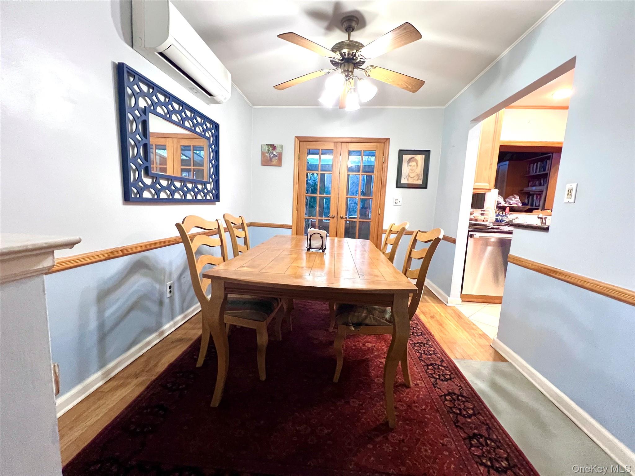 2561 Eastchester Road Bronx, NY 10469 - Photo 6 of 13 a view of a dining room with furniture window and wooden floor