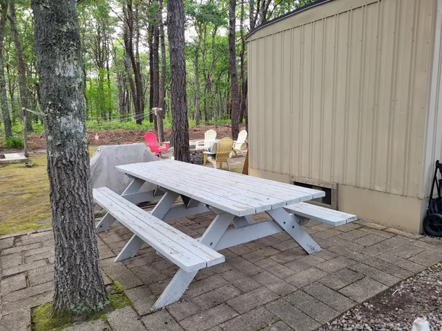 a view of a swimming pool with a patio