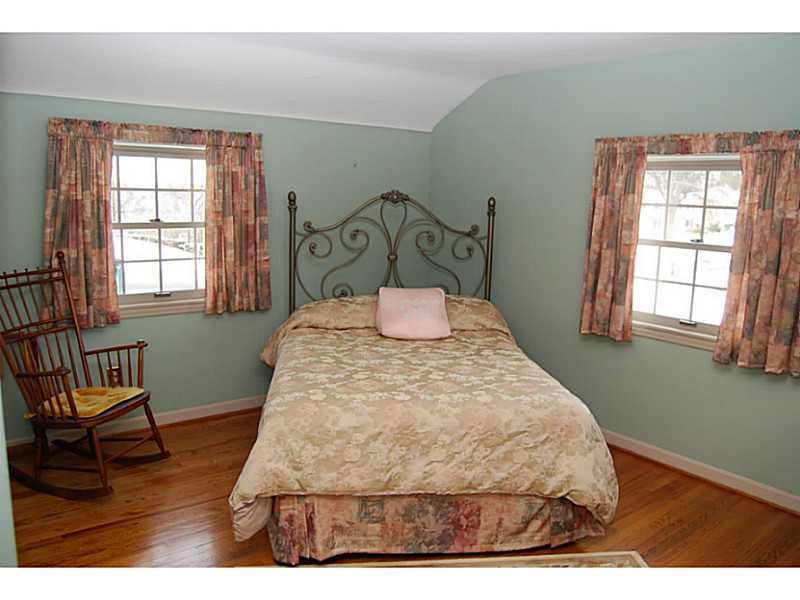 550 Miranda Road Upper St. Clair, PA 15241 - Photo 16 of 25 Bedroom. Hardwood through 2nd level, exposed here in comfortable bedroom
