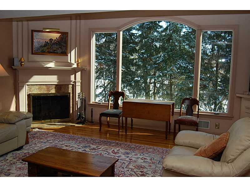 550 Miranda Road Upper St. Clair, PA 15241 - Photo 5 of 25 Den/Family/Great Room. Look out this gorgeous picture window in the arctic cold of winter and see peaceful greenery and toast your toes in a snap by the fireplace