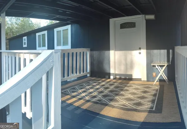 a view of a living room and a window