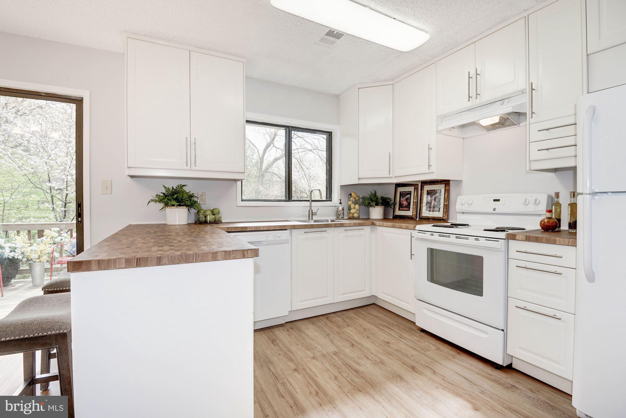 2186 Cartwright Place Reston, VA 20191 - Photo 11 of 33 Solid wood counter tops