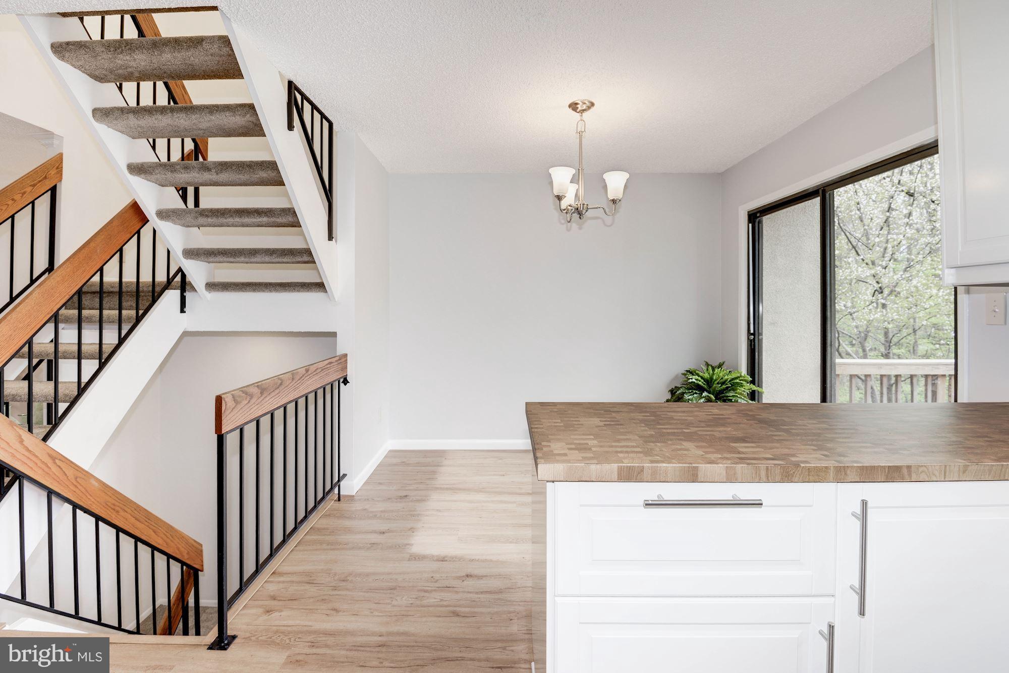 2186 Cartwright Place Reston, VA 20191 - Photo 13 of 33 Table space and bar space