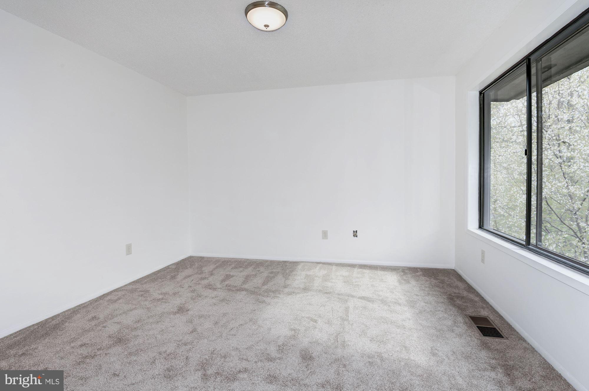2186 Cartwright Place Reston, VA 20191 - Photo 19 of 33 Large master suit over looking the woods