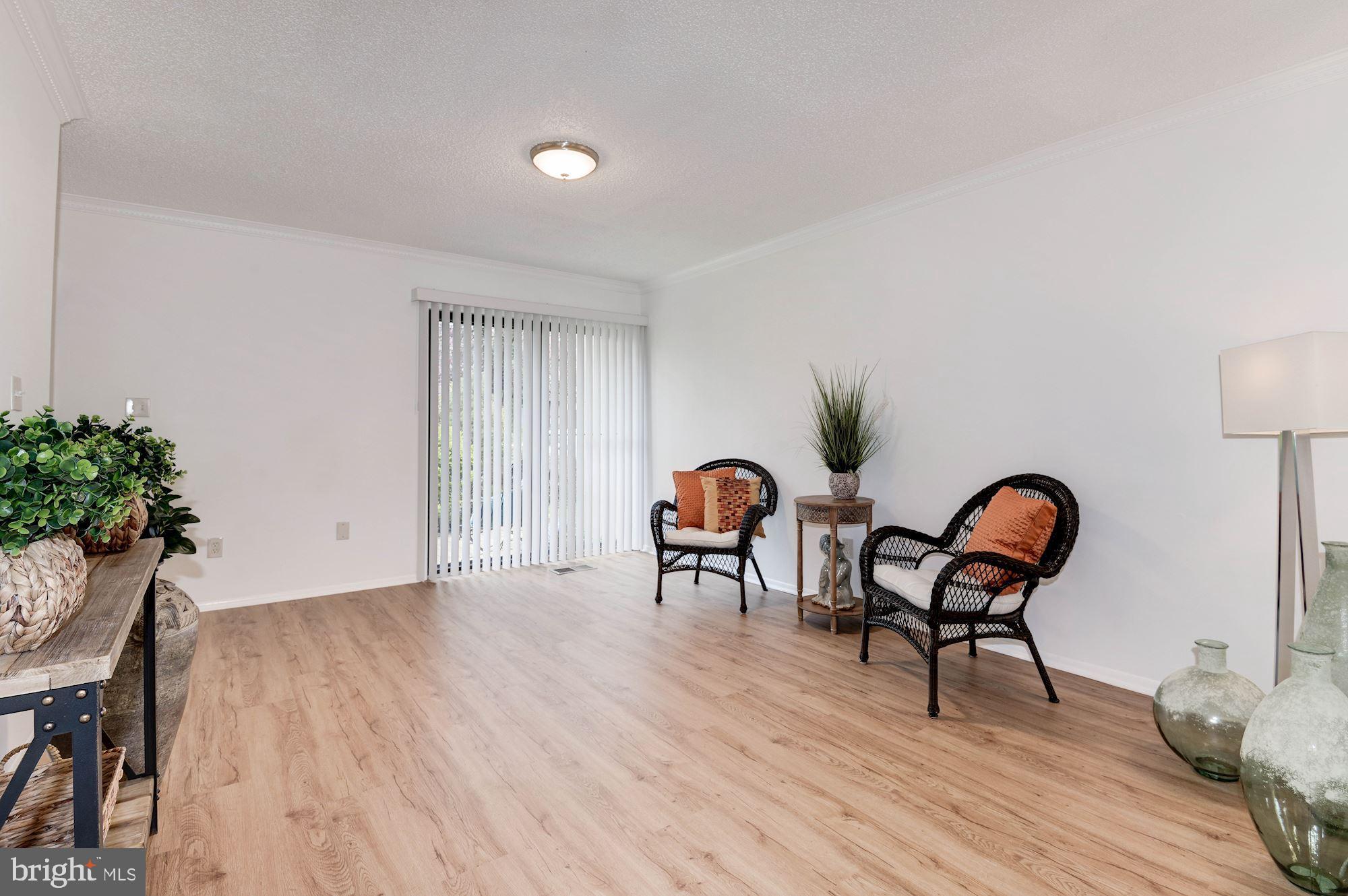 2186 Cartwright Place Reston, VA 20191 - Photo 7 of 33 Freshly painted and new lighting thru out