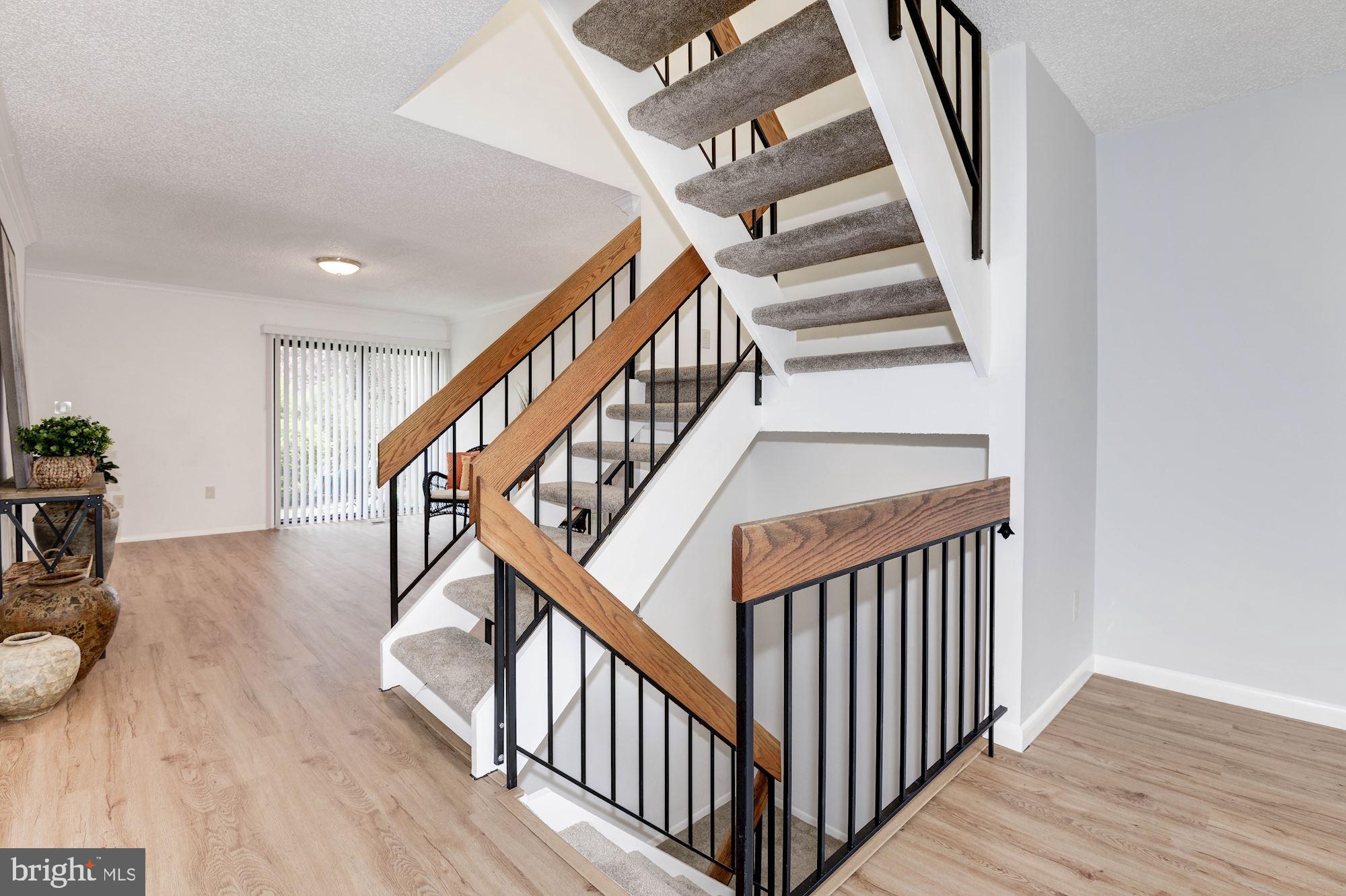 2186 Cartwright Place Reston, VA 20191 - Photo 8 of 33 I love the contemporary stairs
