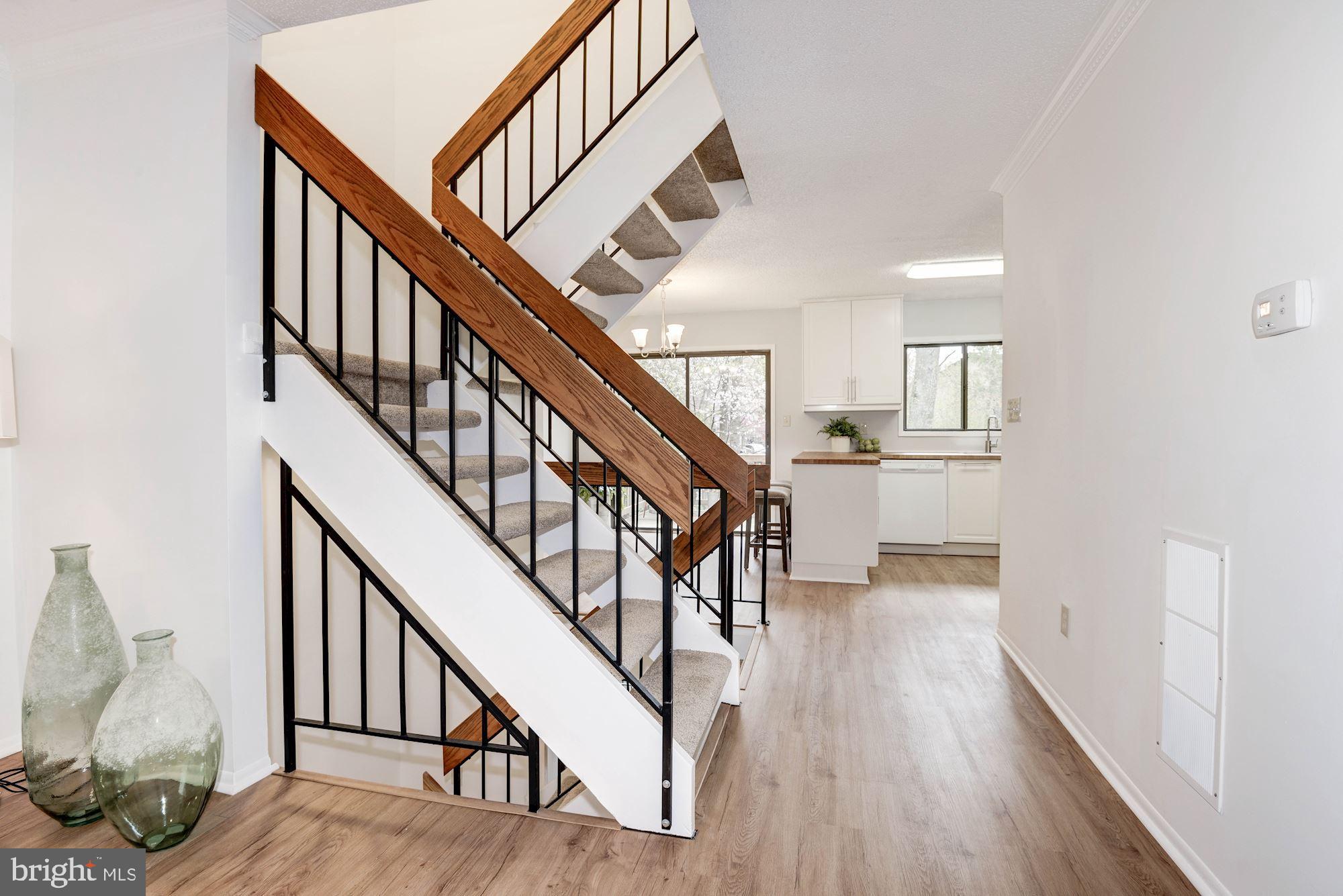 2186 Cartwright Place Reston, VA 20191 - Photo 9 of 33 The open concept stairs give an open feeling