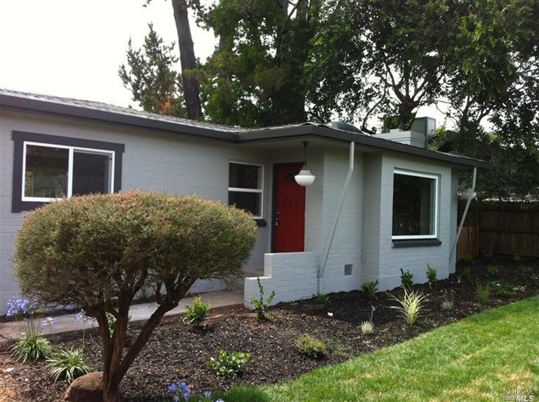 2211 Center Road Novato, CA 94947 - Photo 1 of 1 a house that has a tree in front of the house