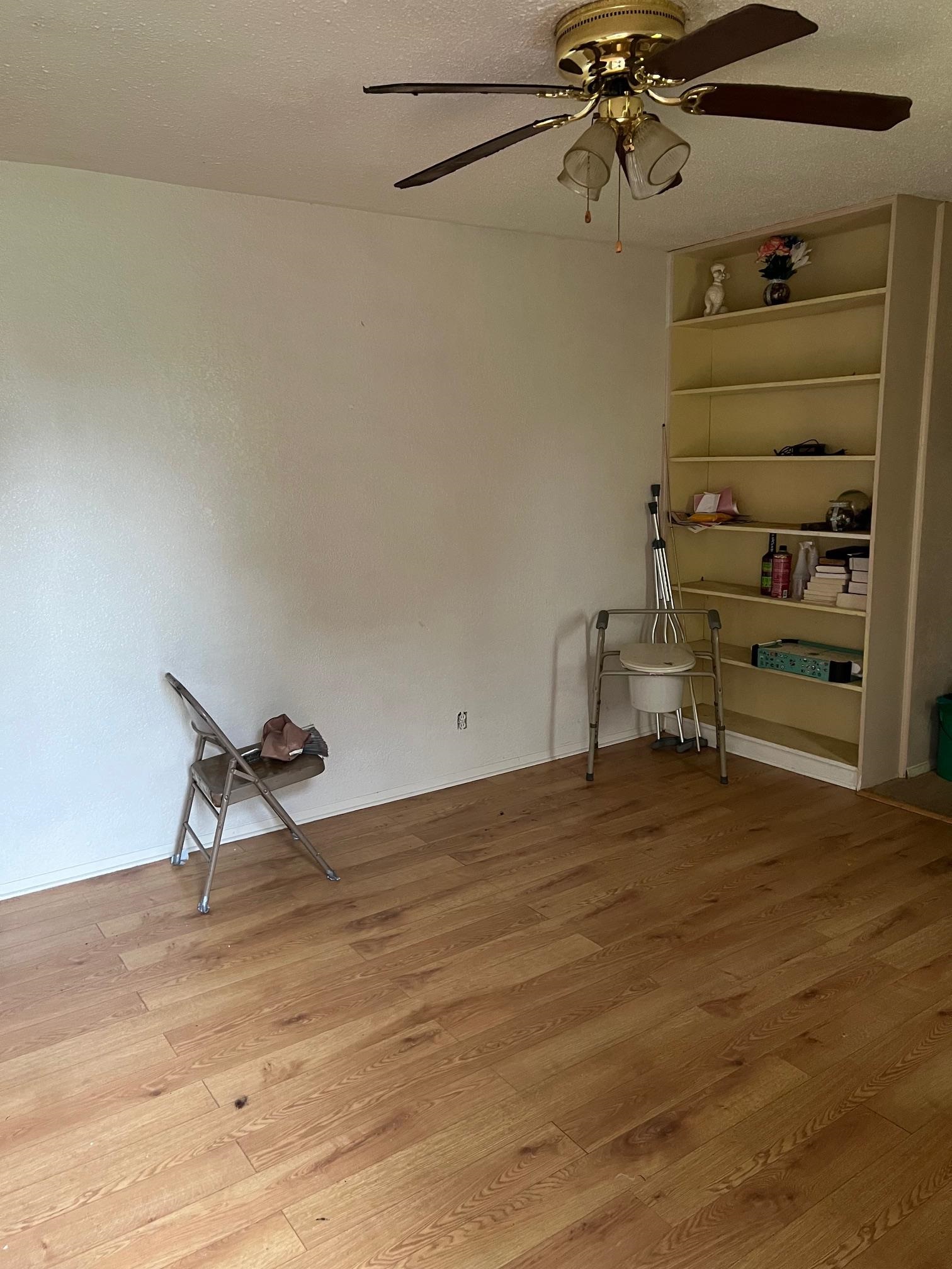 5067 Gill Road Memphis, TN 38109 - Photo 10 of 10 a view of a room with racks on the wall