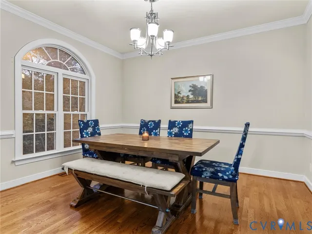 a kitchen with stainless steel appliances a sink stove and refrigerator