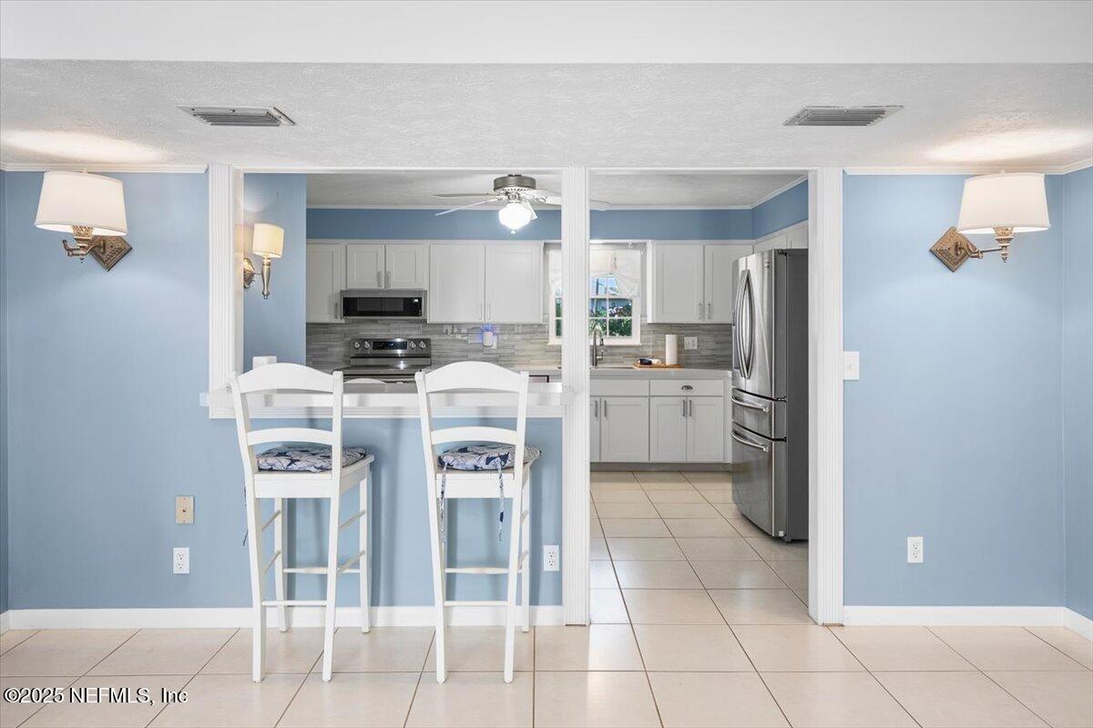2087 Harvard Street Middleburg, FL 32068 - Photo 14 of 48 Dining room to kitchen