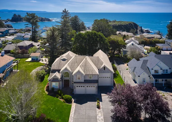 an aerial view of a house with a garden