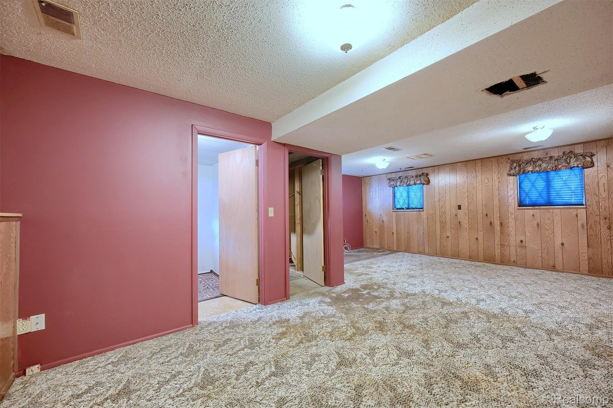 13208 North Linden Road Clio, MI 48420 - Photo 17 of 23 18-Finished-Lower-Level-2nd-View.jpg
