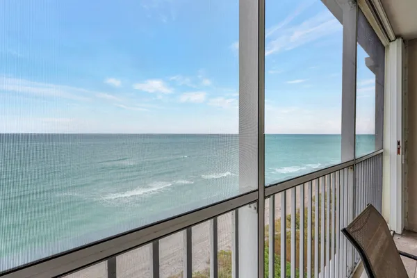 a view of ocean from a balcony