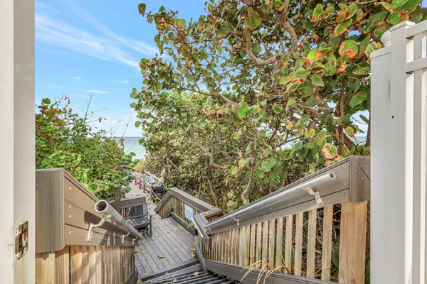 a balcony with wooden fence