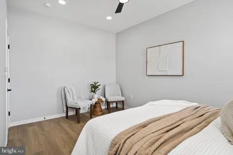 a view of room with window and ceiling fan