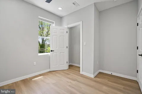 a view of a dining room with furniture and window