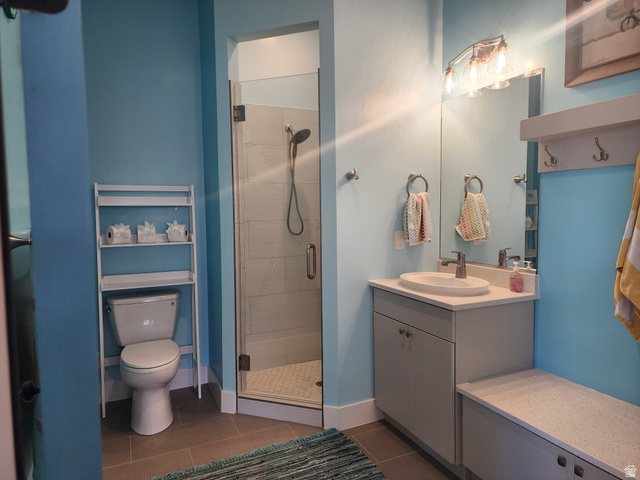 1283 North Gallen Road Santa Clara, UT 84765 - Photo 50 of 103 3/4 Pool Bathroom with vanity, a shower stall, and tile patterned floors