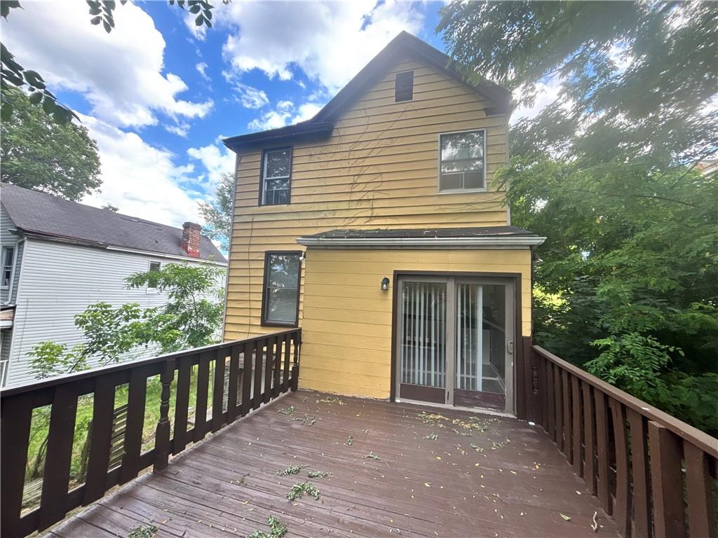 335 Cedarhurst Street Pittsburgh, PA 15210 - Photo 27 of 28 a view of a house with a yard
