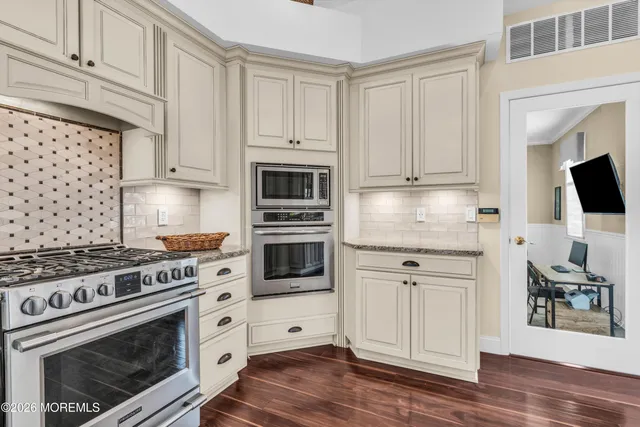 a bathroom with a shower and a toilet