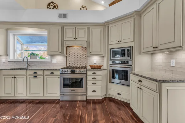 a view of a swimming pool with an outdoor space