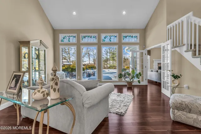 a view of a dining room with furniture window and wooden floor