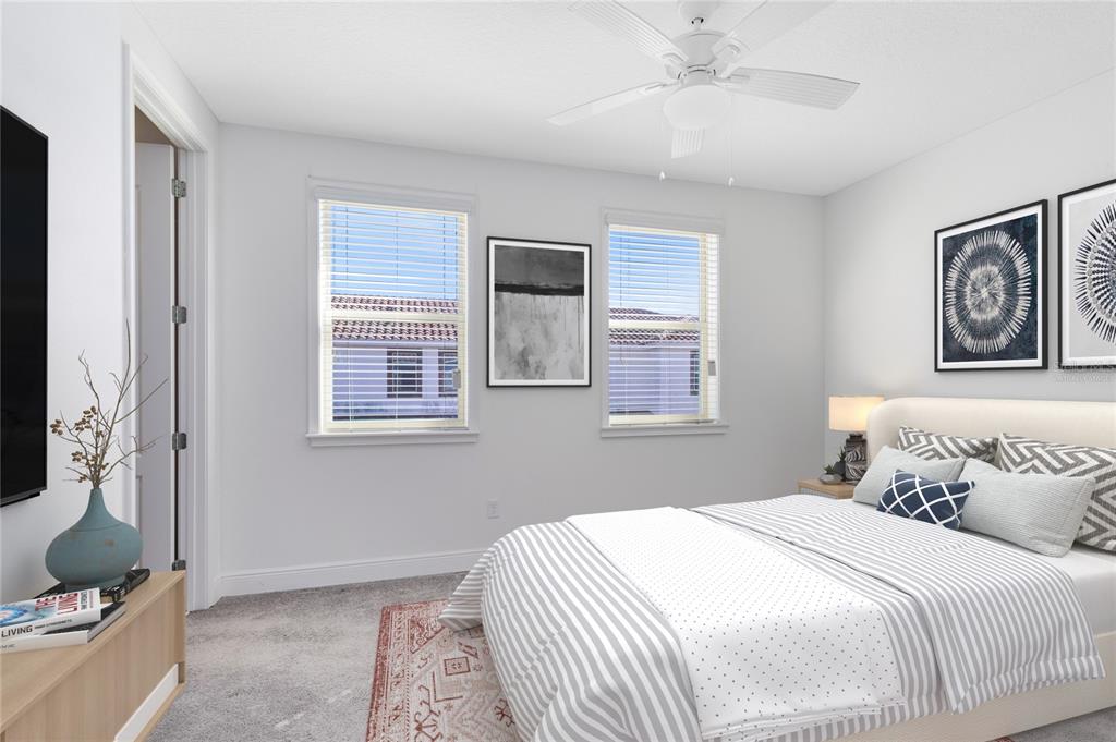 13969 Arclid Street Orlando, FL 32832 - Photo 12 of 29 a bedroom with a bed and a window