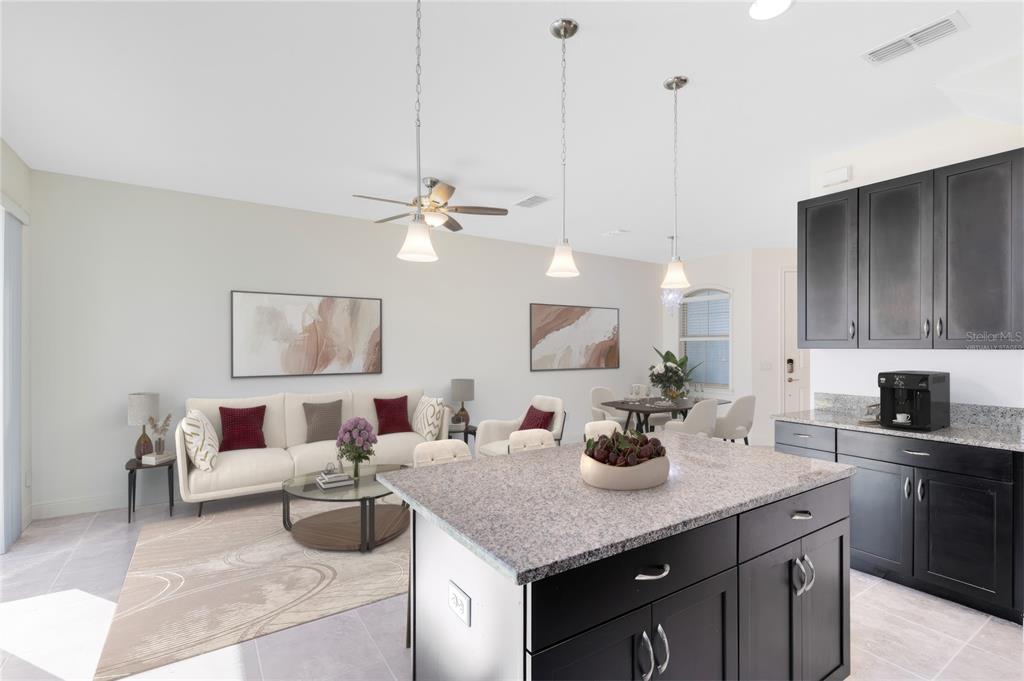 13969 Arclid Street Orlando, FL 32832 - Photo 5 of 29 a kitchen with a stove a sink and cabinets