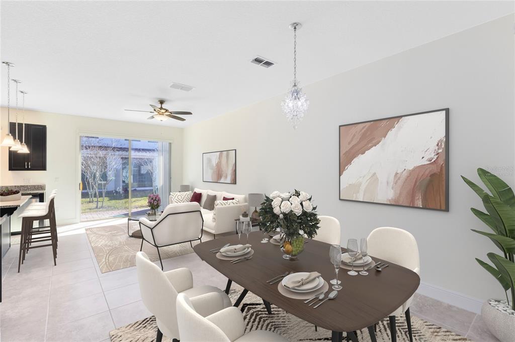 13969 Arclid Street Orlando, FL 32832 - Photo 6 of 29 a view of a dining room with furniture and wooden floor