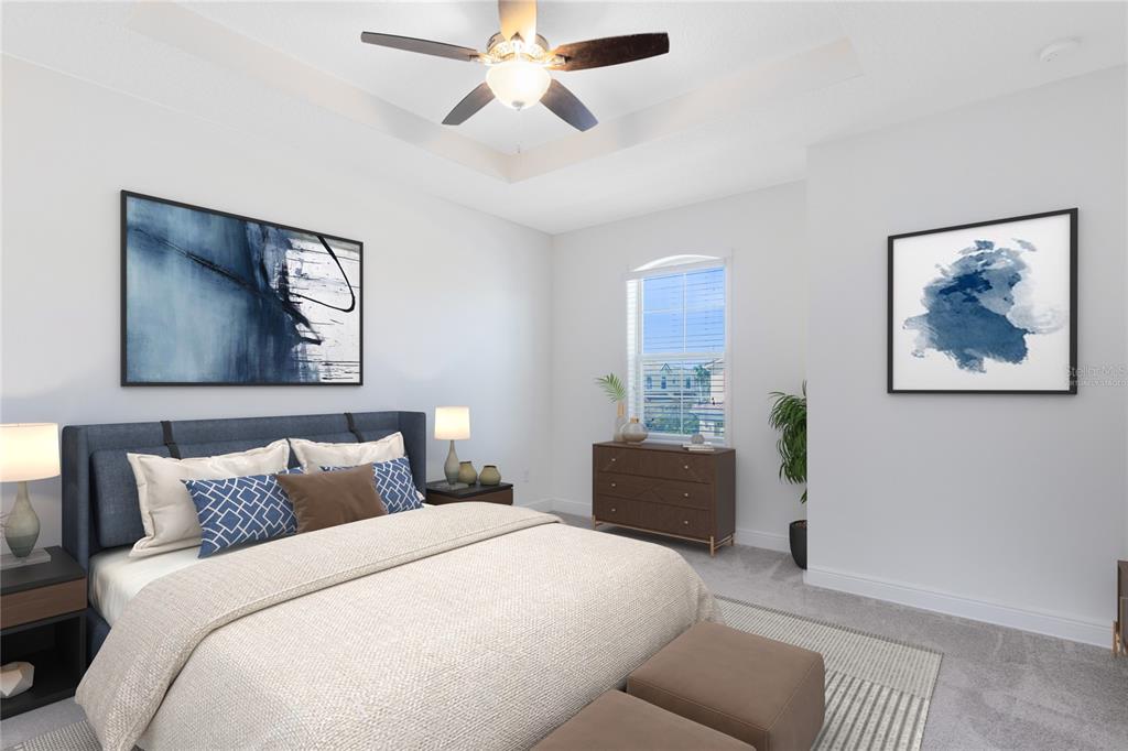 13969 Arclid Street Orlando, FL 32832 - Photo 9 of 29 a bedroom with bed and paintings on the wall