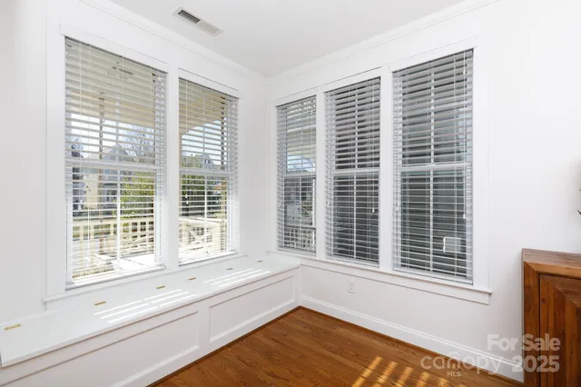 a view of a room with a large window
