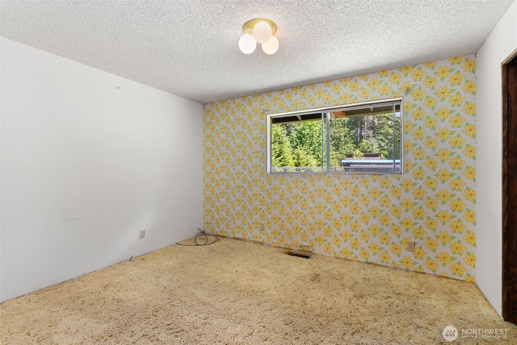 155 Bonell Road Randle, WA 98377 - Photo 24 of 38 an empty room with a empty space and a window
