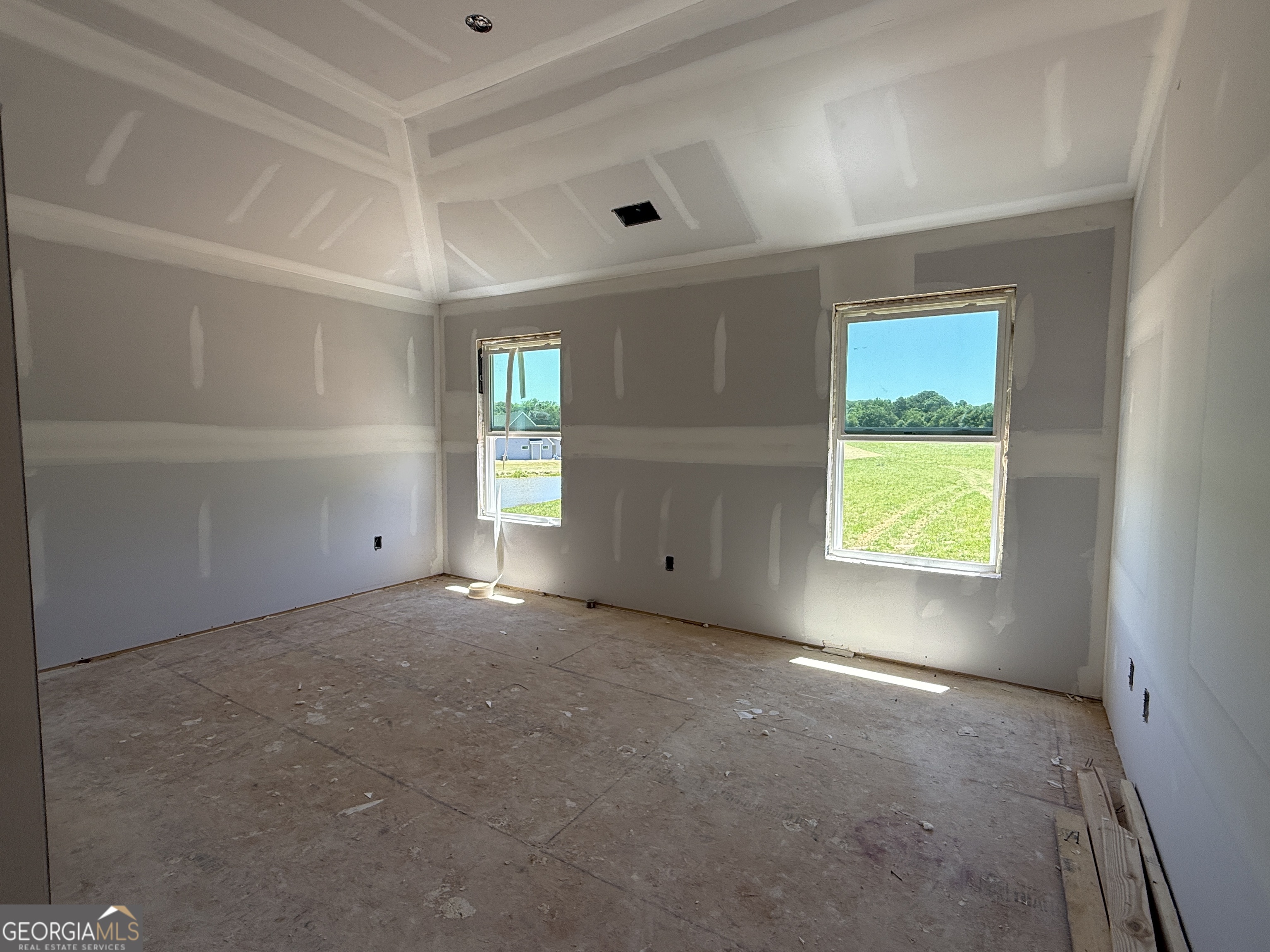10 Rex Road Williamson, GA 30292 - Photo 19 of 63 a view of an empty room with a window