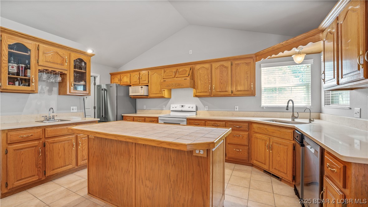 165 Lake Shadow Road Sunrise Beach, MO 65079 - Photo 11 of 50 Spacious kitchen with large island and eat at coun