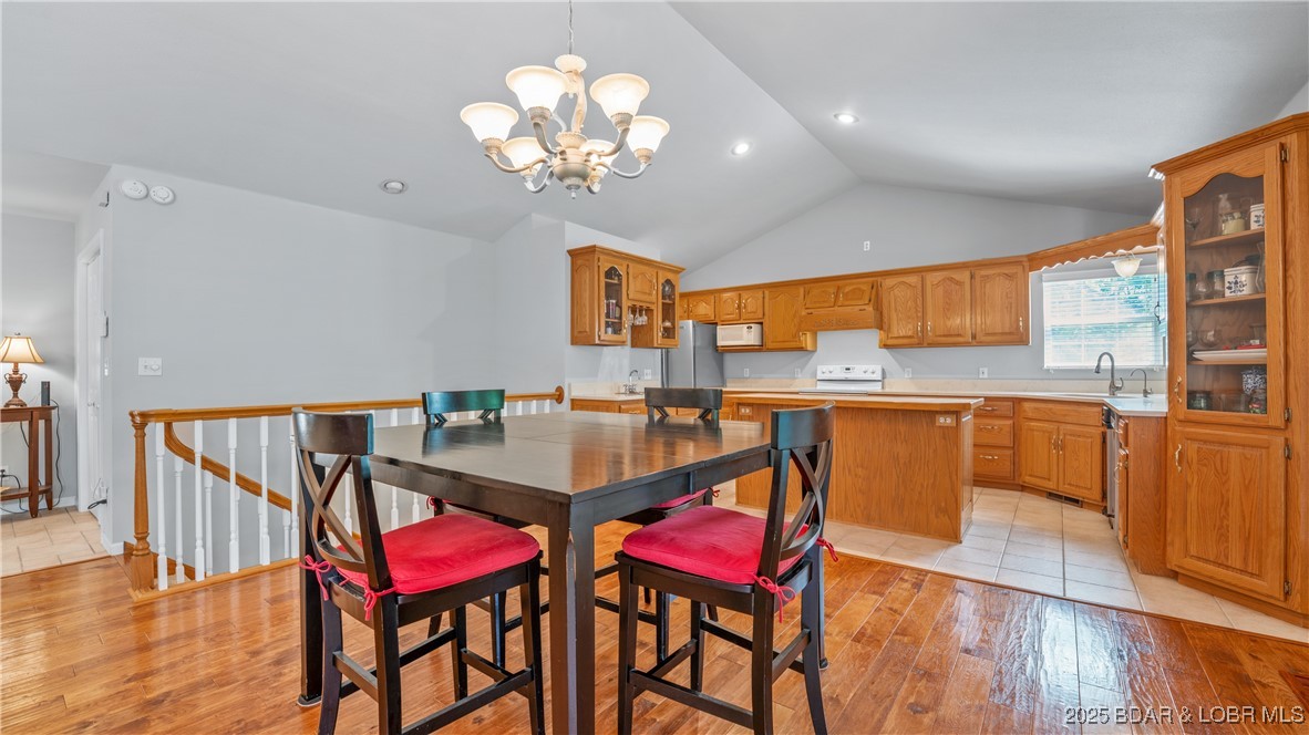 165 Lake Shadow Road Sunrise Beach, MO 65079 - Photo 12 of 50 Large dining space can accommodate an even larger