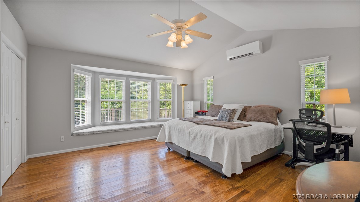 165 Lake Shadow Road Sunrise Beach, MO 65079 - Photo 16 of 50 Enjoy the peaceful view from large bay windows