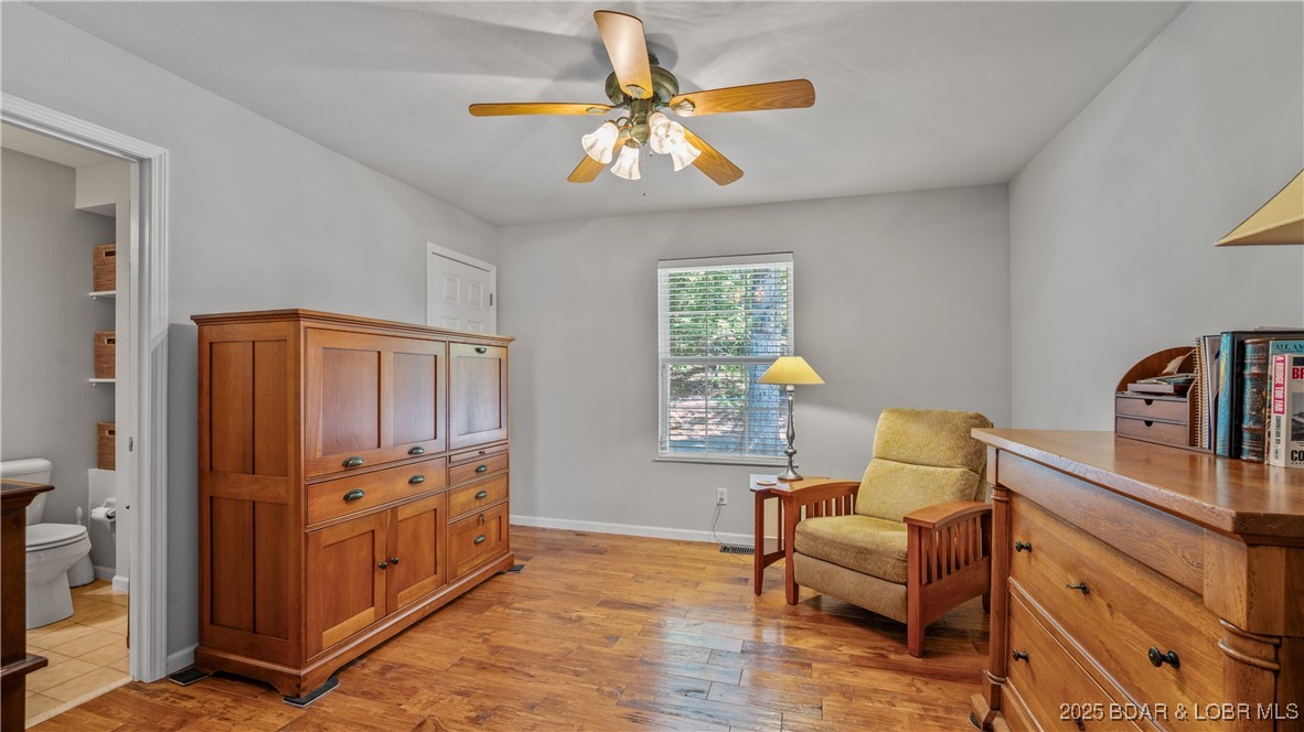 165 Lake Shadow Road Sunrise Beach, MO 65079 - Photo 20 of 50 Main level guest room has an en suite bathroom and