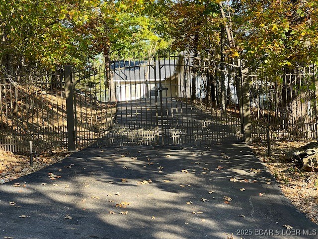 165 Lake Shadow Road Sunrise Beach, MO 65079 - Photo 2 of 50 Gated Estate Entry