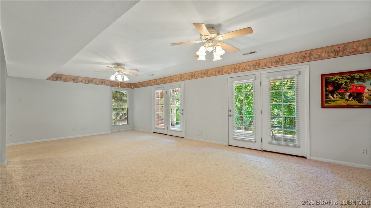 165 Lake Shadow Road Sunrise Beach, MO 65079 - Photo 23 of 50 Massive lower level family room