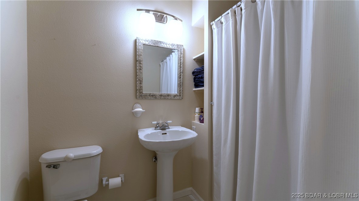 165 Lake Shadow Road Sunrise Beach, MO 65079 - Photo 31 of 50 Guest Bedroom 3 has En Suite Bath