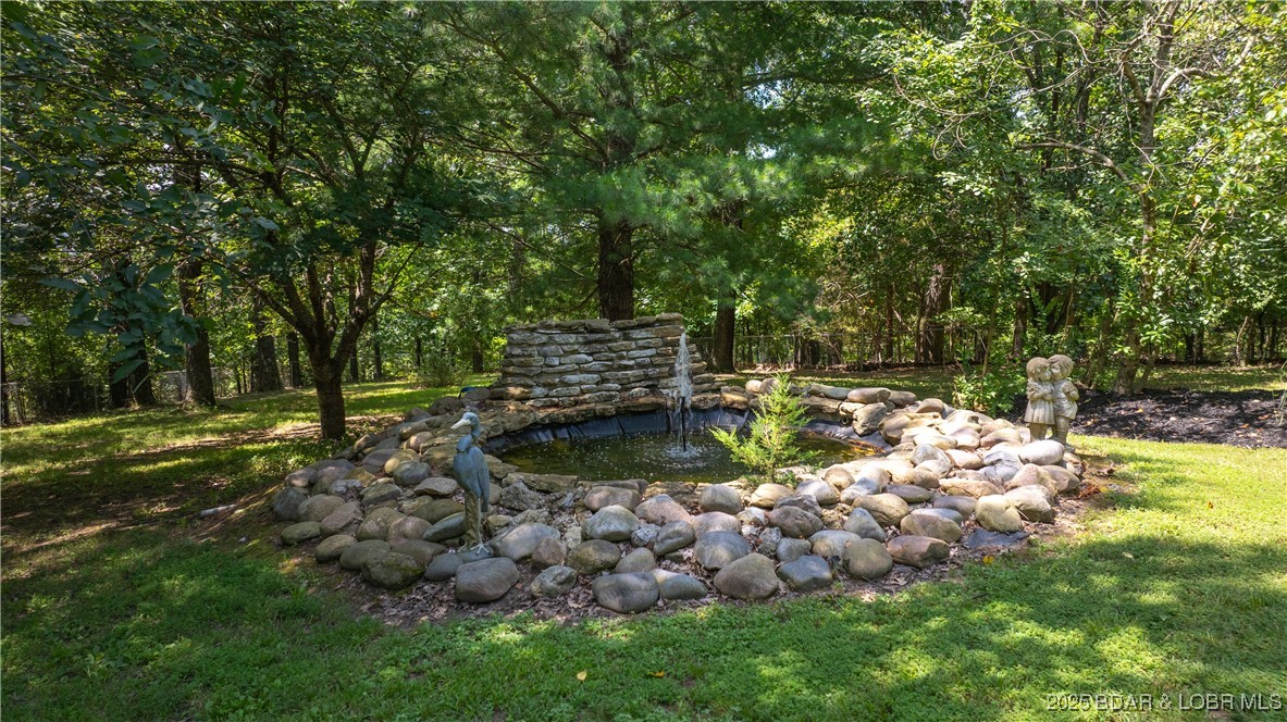 165 Lake Shadow Road Sunrise Beach, MO 65079 - Photo 38 of 50 Lovely water feature with fountain