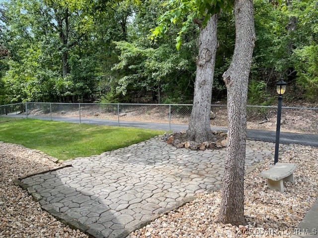 165 Lake Shadow Road Sunrise Beach, MO 65079 - Photo 47 of 50 Nice stone front courtyard