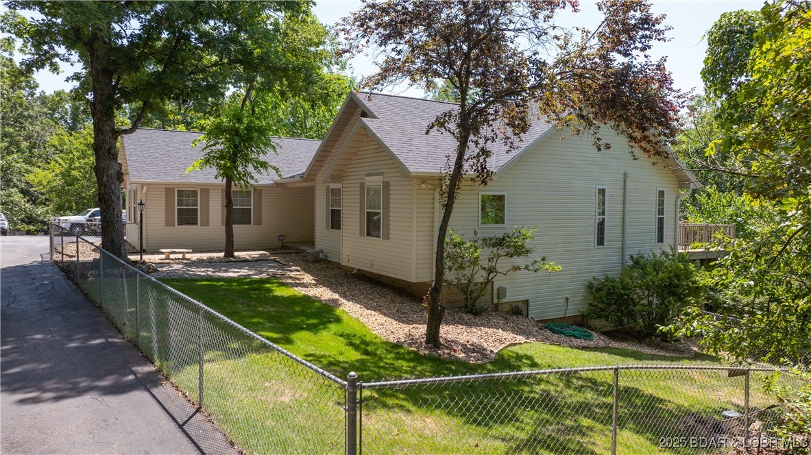 165 Lake Shadow Road Sunrise Beach, MO 65079 - Photo 48 of 50 Front yard is also fully fenced