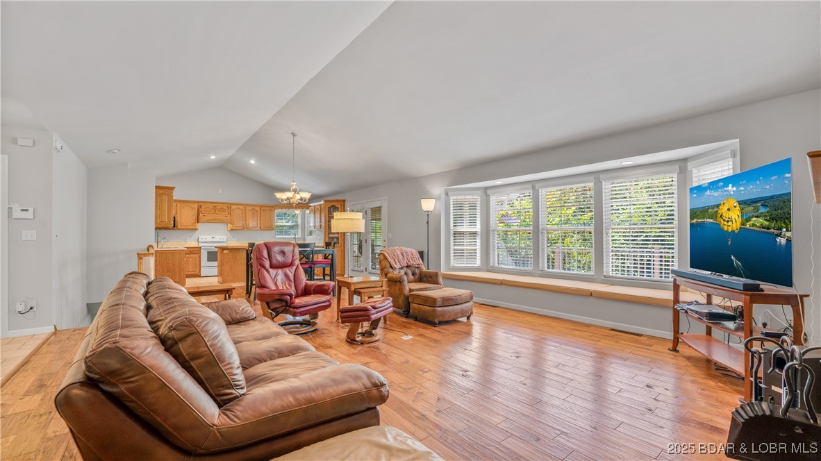 165 Lake Shadow Road Sunrise Beach, MO 65079 - Photo 8 of 50 Large open layout and vaulted main living, dining