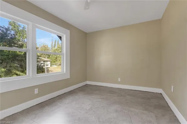 an empty room with a window