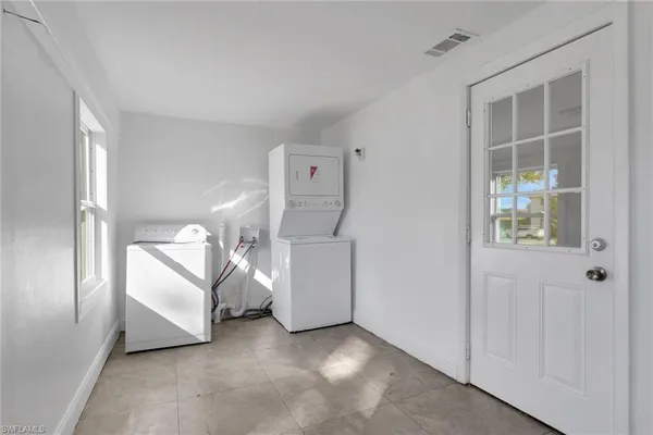 a view of a livingroom with car parked