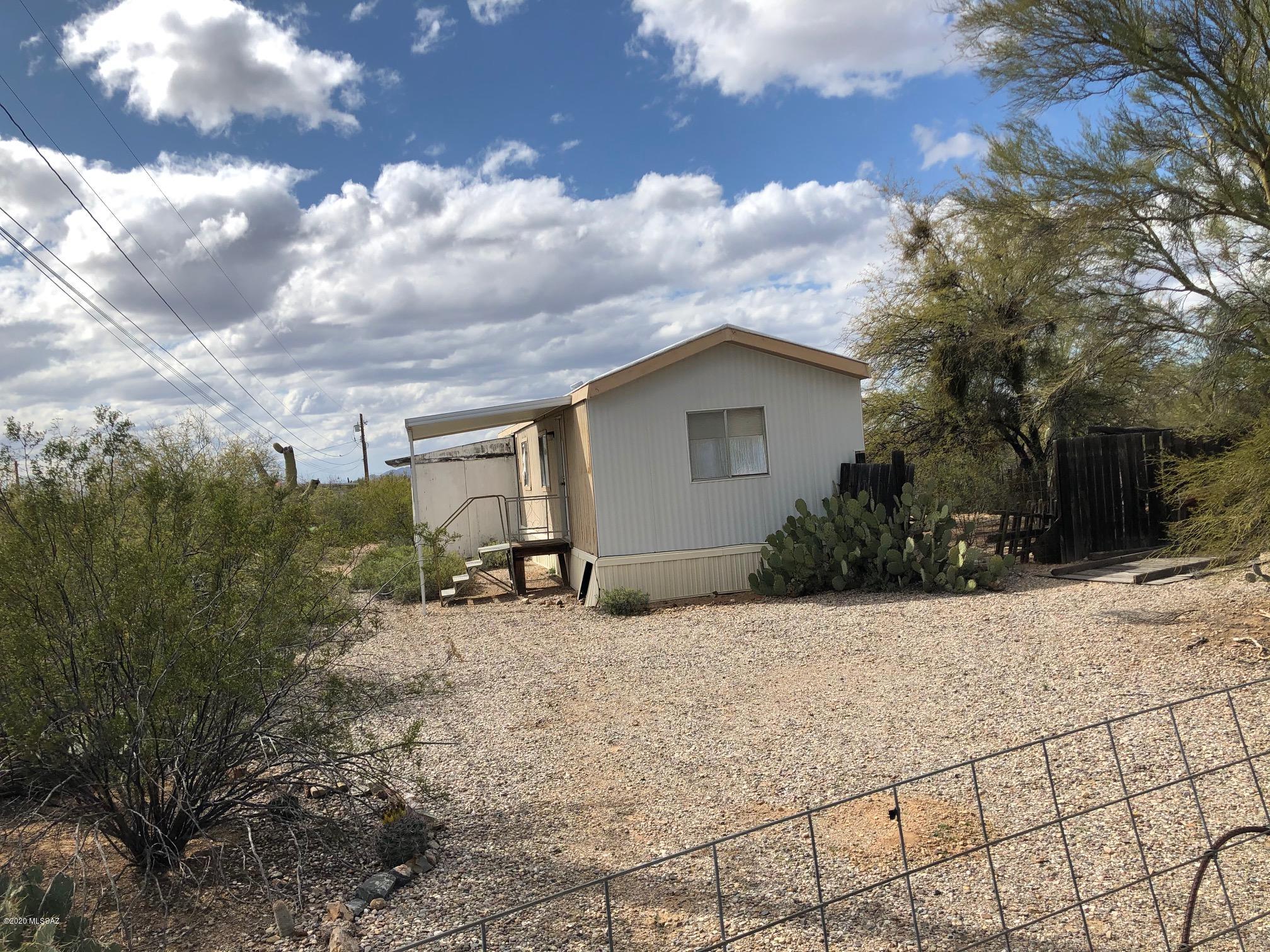 4004 South Aldon Road Tucson, AZ 85735 - Photo 1 of 5 a view of a house with backyard