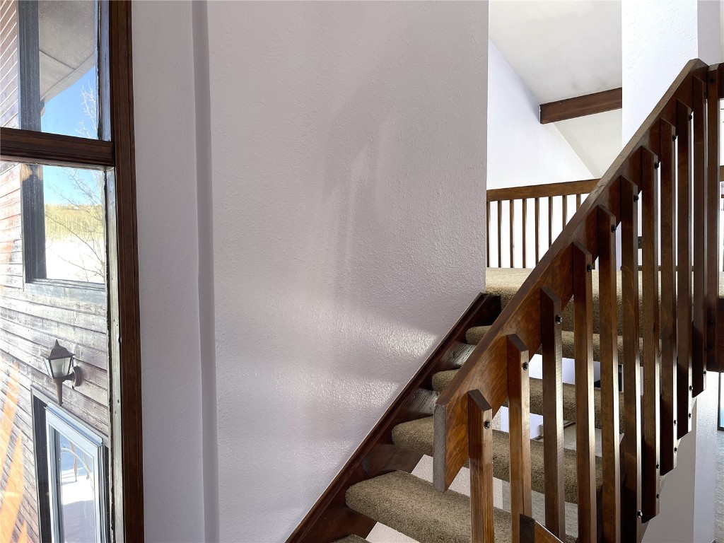 2584 High Creek Road Fairplay, CO 80440 - Photo 22 of 50 a view of staircase with wooden floor and white walls